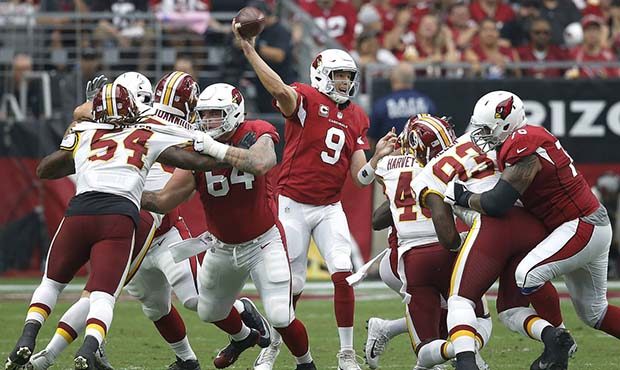 Arizona Cardinals quarterback Sam Bradford (9) throws against the Washington Redskins during the fi...