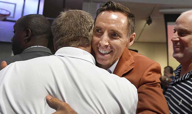 Steve Nash, a class of 2018 inductee into the Basketball Hall of Fame, hugs fans after a news confe...