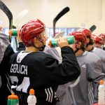 Participants of the Arizona Coyotes’ 2018 rookie camp take a water break between drills at the Ice Den in Scottsdale, Ariz. on Sept. 7, 2018. (Matt Layman/Arizona Sports)
