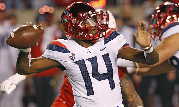 Khalil Tate exits game early, Wildcats fall to Utah