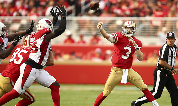 San Francisco 49ers quarterback C.J. Beathard (3) passes as Arizona Cardinals outside linebacker Ch...