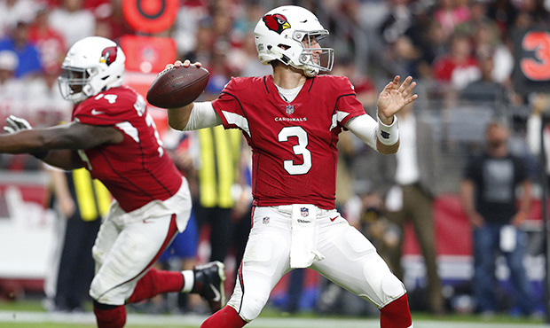 Arizona Cardinals quarterback Josh Rosen (3) throws a pass during the first half of an NFL football...