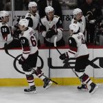 Arizona Coyotes' Lawson Crouse (67) celebrates his goal against the Chicago Blackhawks with his teammates during the first period of an NHL hockey game Thursday, Oct. 18, 2018, in Chicago. (AP Photo/David Banks)