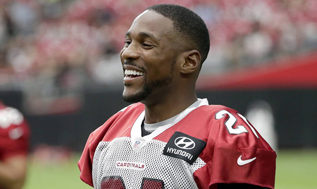 Arizona Cardinals cornerback Patrick Peterson (21) smiles during the first day of NFL football trai...