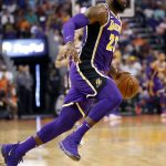 Los Angeles Lakers forward LeBron James (23) drives against the Phoenix Suns during the first half of an NBA basketball game, Wednesday, Oct. 24, 2018, in Phoenix. (AP Photo/Matt York)