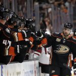 Anaheim Ducks' Ryan Kesler, right, celebrates with teammates after scoring against the Arizona Coyotes during the first period of an NHL hockey game Wednesday, Oct. 10, 2018, in Anaheim, Calif. (AP Photo/Marcio Jose Sanchez)