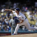 Los Angeles Dodgers starting pitcher Walker Buehler throws against the Colorado Rockies during the fourth inning of a tiebreaker baseball game, Monday, Oct. 1, 2018, in Los Angeles. (AP Photo/Jae C. Hong)