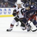 Arizona Coyotes' Lawson Crouse, left, and Columbus Blue Jackets' Artemi Panarin, of Russia, chase a loose puck during the third period of an NHL hockey game Tuesday, Oct. 23, 2018, in Columbus, Ohio. The Coyotes beat the Blue Jackets 4-1. (AP Photo/Jay LaPrete)