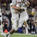 Stanford's Sean Barton (27) celebrates his interception against Arizona State with teammate Dylan Jackson during the first half of an NCAA college football game Thursday, Oct. 18, 2018, in Tempe, Ariz. (AP Photo/Darryl Webb)