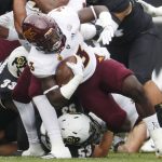 Arizona State running back Eno Benjamin, top, is tackled by Colorado linebacker Nate Landman in the first half of an NCAA college football game Saturday, Oct. 6, 2018, in Boulder, Colo. (AP Photo/David Zalubowski)