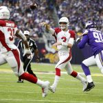 Arizona Cardinals quarterback Josh Rosen (3) throws a pass as he is pressured by Minnesota Vikings defensive end Stephen Weatherly (91) during the first half of an NFL football game, Sunday, Oct. 14, 2018, in Minneapolis. (AP Photo/Bruce Kluckhohn)