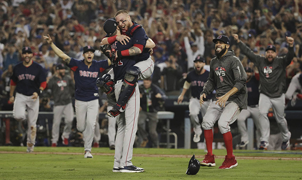The Boston Red Sox celebrate after Game 5 of baseball's World Series against the Los Angeles Dodger...