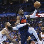 Oklahoma City Thunder forward Nerlens Noel, right, is fouled by Phoenix Suns center Tyson Chandler, left, as he goes to the basket in the second half of an NBA basketball game in Oklahoma City, Sunday, Oct. 28, 2018. (AP Photo/Sue Ogrocki)