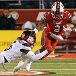 Arizona safety Demetrius Flannigan-Fowles (6) tackles Utah running back Zack Moss (2) during the first half during an NCAA college football game Friday, Oct. 12, 2018, in Salt Lake City. (AP Photo/Rick Bowmer)