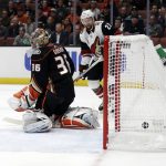 Anaheim Ducks goaltender John Gibson (36) gives up a goal on a shot from Arizona Coyotes' Dylan Strome, not seen, during the first period of an NHL hockey game Wednesday, Oct. 10, 2018, in Anaheim, Calif. (AP Photo/Marcio Jose Sanchez)