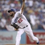 Los Angeles Dodgers starting pitcher Clayton Kershaw throws against the Boston Red Sox during the first inning in Game 5 of the World Series baseball game on Sunday, Oct. 28, 2018, in Los Angeles. (Ezra Shaw/Pool Photo via AP)