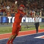 Arizona wide receiver Shawn Poindexter celebrates after scoring a touchdown in the first half during an NCAA college football game against Oregon, Saturday, Oct. 27, 2018, in Tucson, Ariz. (AP Photo/Rick Scuteri)