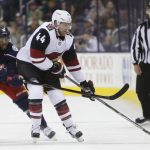 Arizona Coyotes' Kevin Connauton, right, carries the puck up ice as Columbus Blue Jackets' Anthony Duclair defends during the first period of an NHL hockey game Tuesday, Oct. 23, 2018, in Columbus, Ohio. (AP Photo/Jay LaPrete)