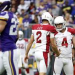 Arizona Cardinals kicker Phil Dawson (4) celebrates with teammate Andy Lee (2) after making a 26-yard field goal during the first half of an NFL football game against the Minnesota Vikings, Sunday, Oct. 14, 2018, in Minneapolis. (AP Photo/Bruce Kluckhohn)