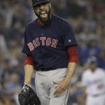 Boston Red Sox pitcher Rick Porcello celebrates the end of the seventh inning in Game 5 of the World Series baseball game against the Los Angeles Dodgers on Sunday, Oct. 28, 2018, in Los Angeles. (AP Photo/David J. Phillip)
