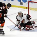 Arizona Coyotes goaltender Antti Raanta, right, stops a shot from Anaheim Ducks' Troy Terry (61) during the shootout in an NHL hockey game Wednesday, Oct. 10, 2018, in Anaheim, Calif. (AP Photo/Marcio Jose Sanchez)