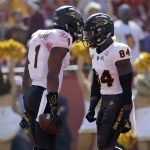 Arizona State's N'Keal Harry (1) celebrates his touchdown catch with teammate Frank Darby during the first half of an NCAA college football game against Southern California Saturday, Oct. 27, 2018, in Los Angeles. (AP Photo/Marcio Jose Sanchez)