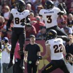 Arizona State running back Eno Benjamin (3) celebrates his rushing touchdown with teammate Frank Darby (84) during the first half of an NCAA college football game Saturday, Oct. 27, 2018, in Los Angeles. (AP Photo/Marcio Jose Sanchez)