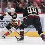 Anaheim Ducks' Sam Steel (34) controls the puck against the Arizona Coyotes' Kevin Connauton during the first period of an NHL hockey game Saturday, Oct. 6, 2018, in Glendale, Ariz. (AP Photo/Darryl Webb)