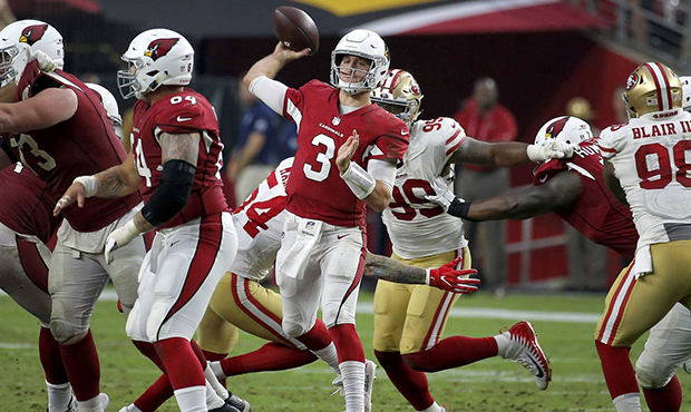 Arizona Cardinals quarterback Josh Rosen (3) throws as San Francisco 49ers defensive tackle DeFores...