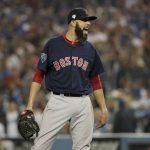 Boston Red Sox starting pitcher David Price celebrates the end of the seventh inning in Game 5 of the World Series baseball game against the Los Angeles Dodgers on Sunday, Oct. 28, 2018, in Los Angeles. (AP Photo/Jae C. Hong)
