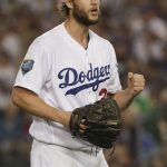 Los Angeles Dodgers starting pitcher Clayton Kershaw celebrates after the last out in the top of the fourth inning against the Boston Red Sox in Game 5 of the World Series baseball game on Sunday, Oct. 28, 2018, in Los Angeles. (AP Photo/Jae C. Hong)