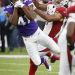 Minnesota Vikings defensive back Anthony Harris (41) intercepts a pass intended for Arizona Cardinals wide receiver Larry Fitzgerald during the second half of an NFL football game, Sunday, Oct. 14, 2018, in Minneapolis. (AP Photo/Bruce Kluckhohn)