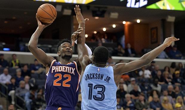 Phoenix Suns center Deandre Ayton (22) shoots against Memphis Grizzlies forward Jaren Jackson Jr. (...