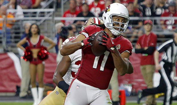Arizona Cardinals wide receiver Larry Fitzgerald (11) pulls in a touchdown catch as San Francisco 4...