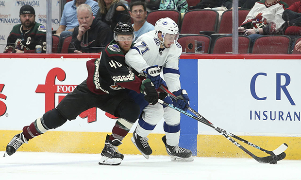 Tampa Bay Lightning's Anthony Cirelli (71) skates with the puck as Arizona Coyotes' Michael Grabner...