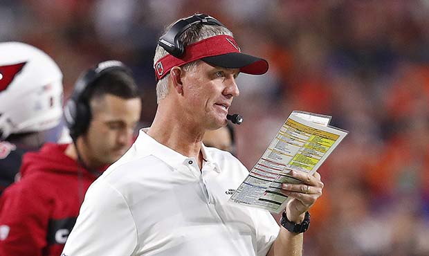 Former Arizona Cardinals offensive coordinator Mike McCoy call a play during the first half of an N...