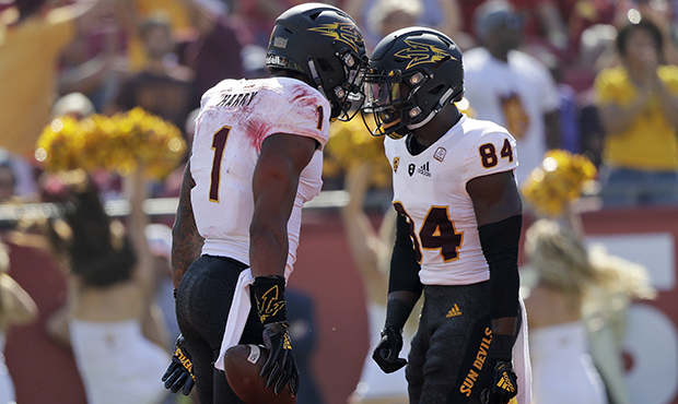 Arizona State's N'Keal Harry (1) celebrates his touchdown catch with teammate Frank Darby during th...