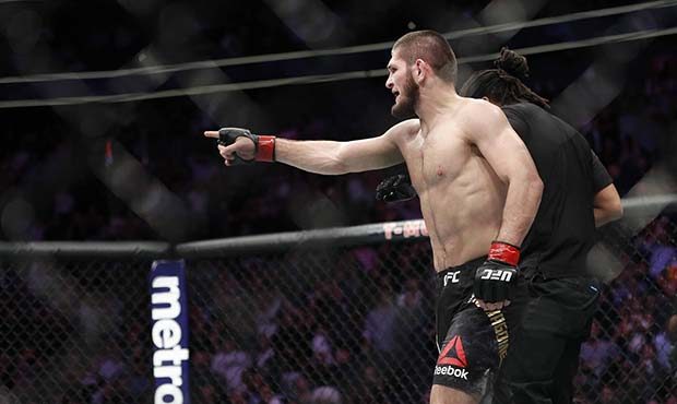 Khabib Nurmagomedov gestures after fighting Conor McGregor during a lightweight title mixed martial...