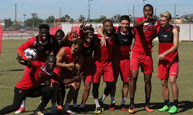 Phoenix Rising players decide to have a little fun after a shooting drill in practice. The Rising f...