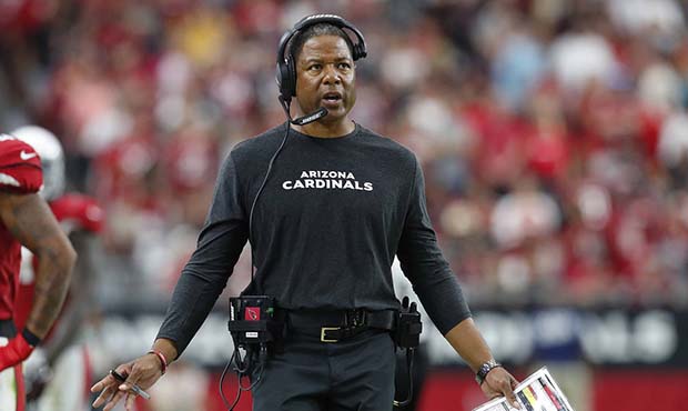 Arizona Cardinals head coach Steve Wilks makes a call during the second half of an NFL football gam...