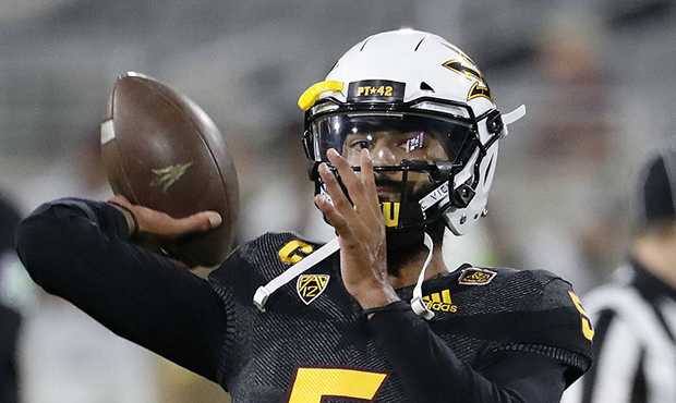 Arizona State quarterback Manny Wilkins warms up for the team's NCAA college football game against ...