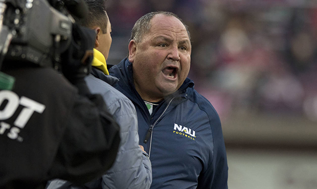 Northern Arizona head coach Jerome Souers reacts to a penalty called against his team while playing...