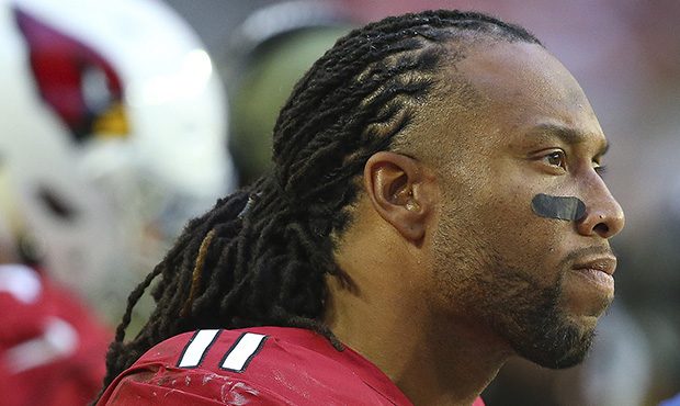 Arizona Cardinals wide receiver Larry Fitzgerald watches during the second half of an NFL football ...