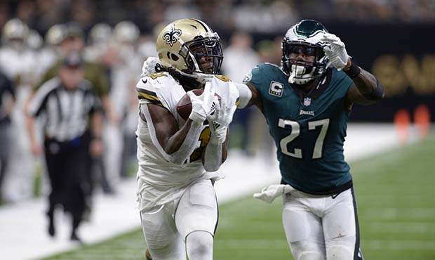 New Orleans Saints running back Alvin Kamara (41) pulls in a touchdown reception in front of Philad...