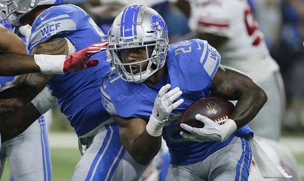 Detroit Lions running back Ameer Abdullah rushes during the first half of an NFL football game agai...