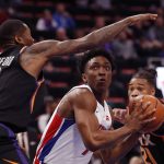 Detroit Pistons forward Stanley Johnson (7) looks to shoot as Phoenix Suns guard Jamal Crawford (11) defends during the first half of an NBA basketball game, Sunday, Nov. 25, 2018, in Detroit. (AP Photo/Carlos Osorio)
