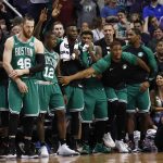 Players on the Boston Celtics bench celebrate as time expires in the second half of the team's NBA basketball game against the Phoenix Suns, Thursday, Nov. 8, 2018, in Phoenix. The Celtics won 116-109 in overtime. (AP Photo/Matt York)