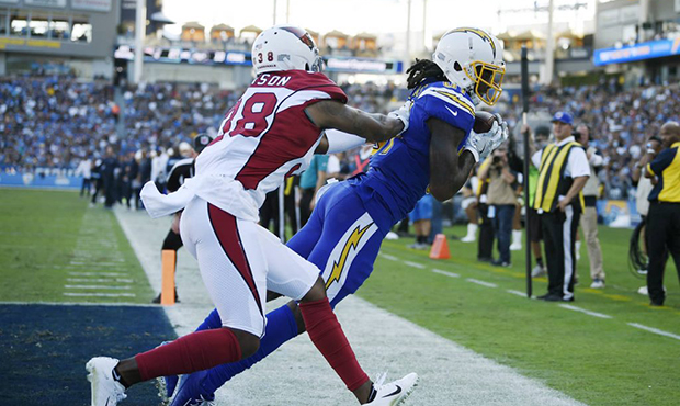 Los Angeles Chargers wide receiver Mike Williams, right, makes a touchdown catch next to Arizona Ca...