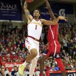 While being guarded by Arizona guard Brandon Randolph (5), Iowa State guard Nick Weiler-Babb (1) goes for a slam dunk during the first half of an NCAA college basketball game at the Maui Invitational, Monday, Nov. 19, 2018, in Lahaina, Hawaii. (AP Photo/Marco Garcia)