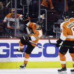 Philadelphia Flyers' Travis Konecny, left, and Travis Sanheim celebrate after Konecny's goal during the first period of an NHL hockey game against the Arizona Coyotes, Thursday, Nov. 8, 2018, in Philadelphia. (AP Photo/Matt Slocum)